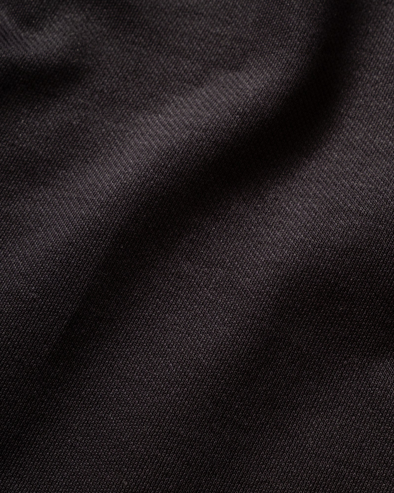 Close-up of IKIJI Navy Blouson Shirt Jacket material texture.