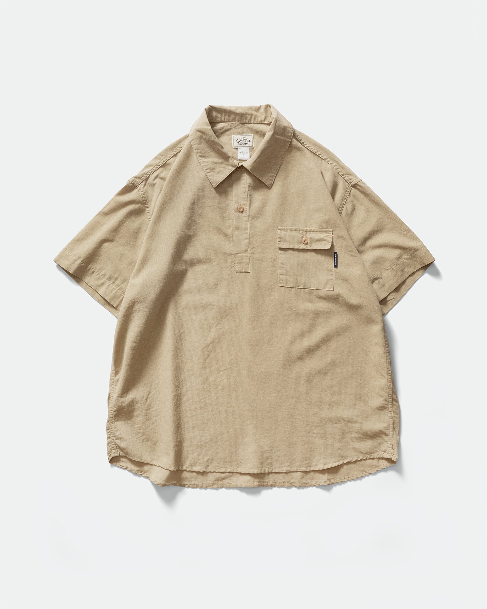 Pack shot of Kappy beige Pigment Henleyneck short sleeve Shirt with collar, button chest pocket and two button lapel on a grey background 