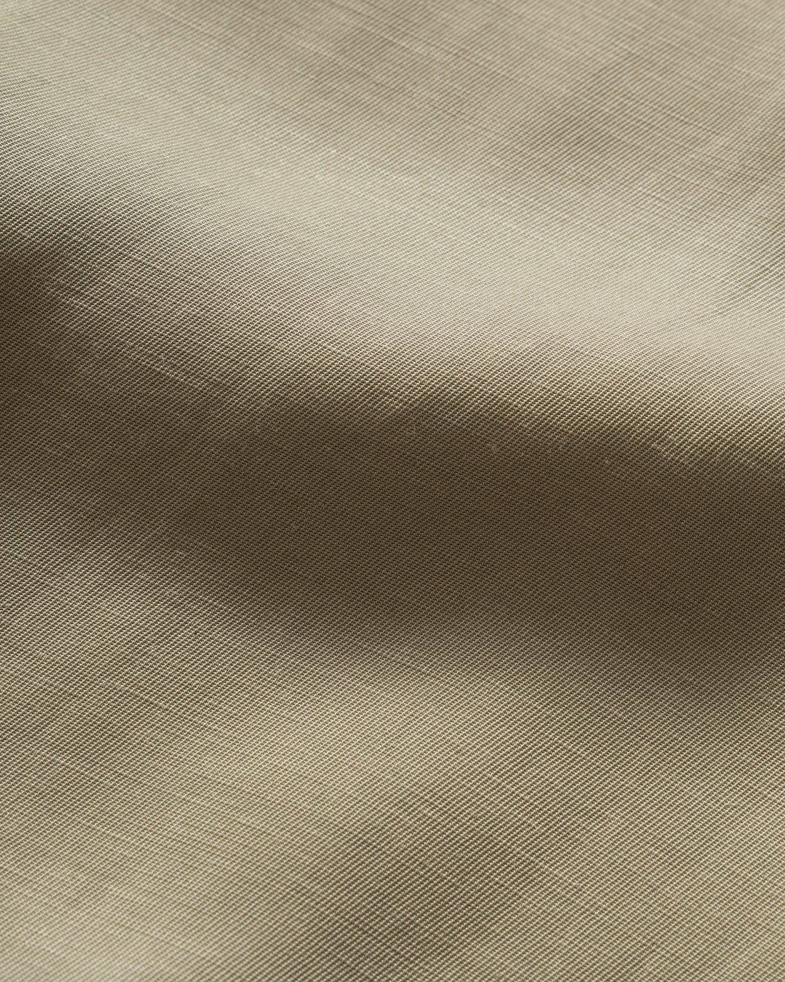 Close up of Still By Hand Sage Pigment Print Zip Blouson fabric detail.
