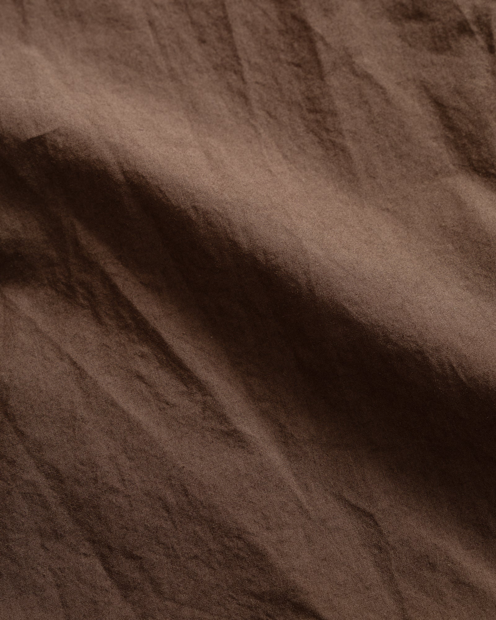 Close-up of brown fabric texture