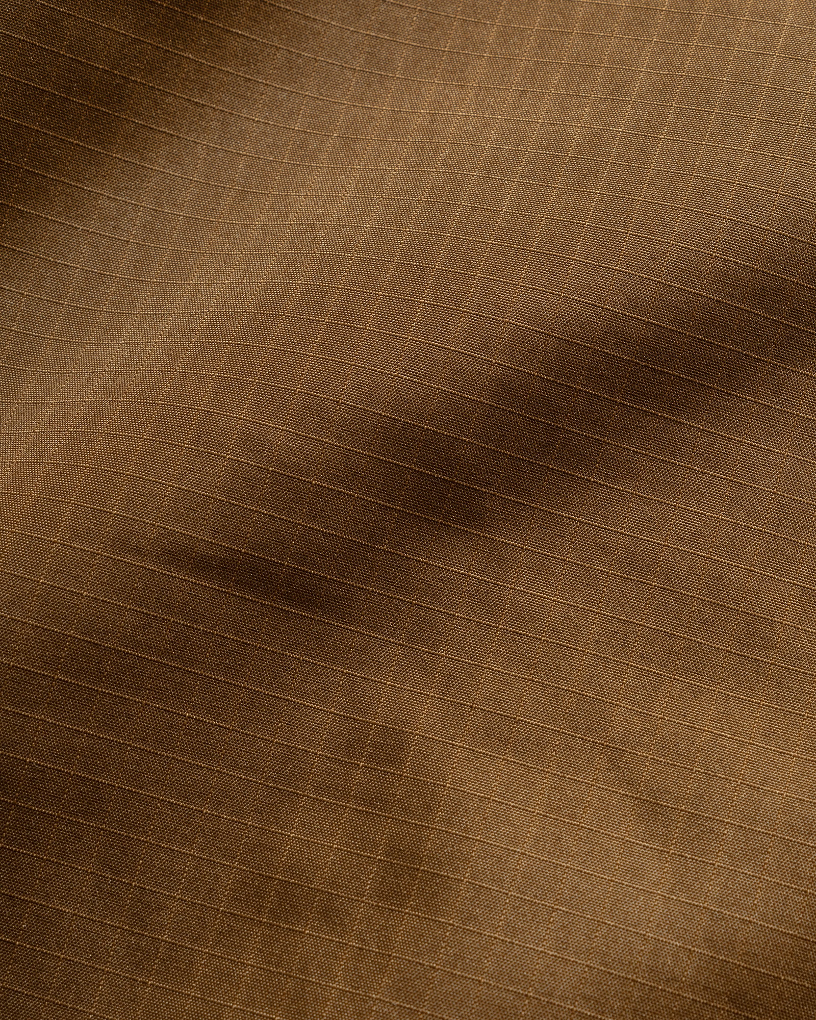 Close-up fabric detail of TAION ripstop Nylon Military Reversible Anorak Parka.